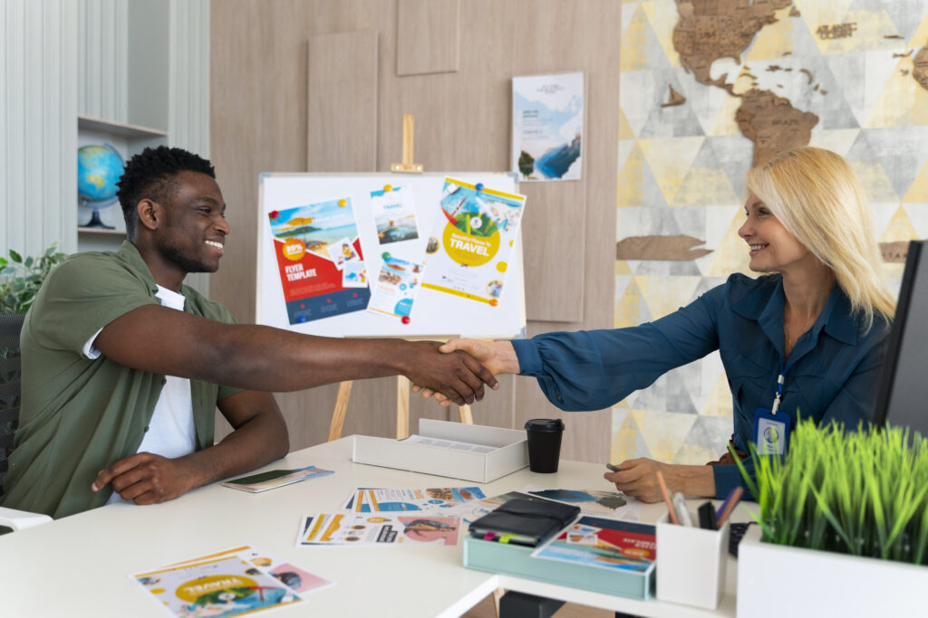 " woman and man shaking hands "